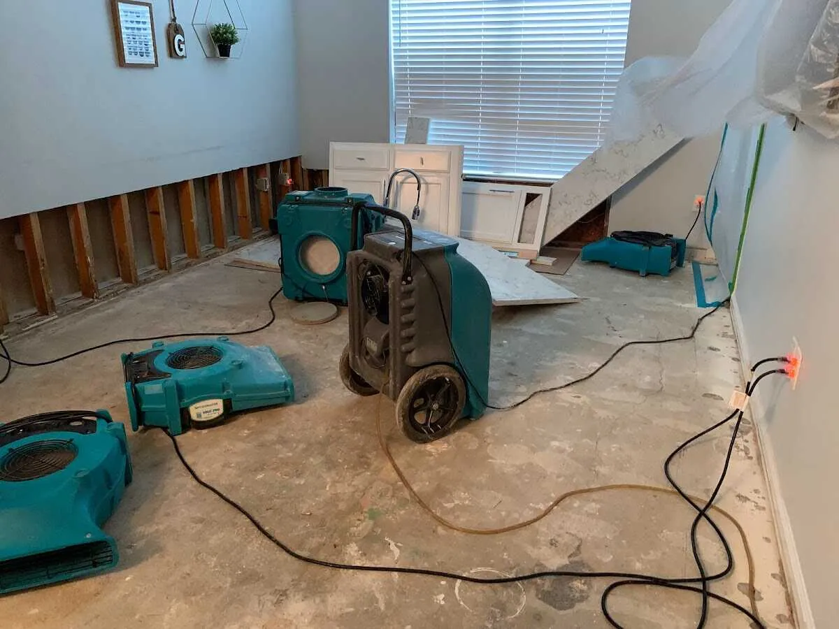 Dehumidifier in flood-cut room for Water Damage Restoration in Independent Hill